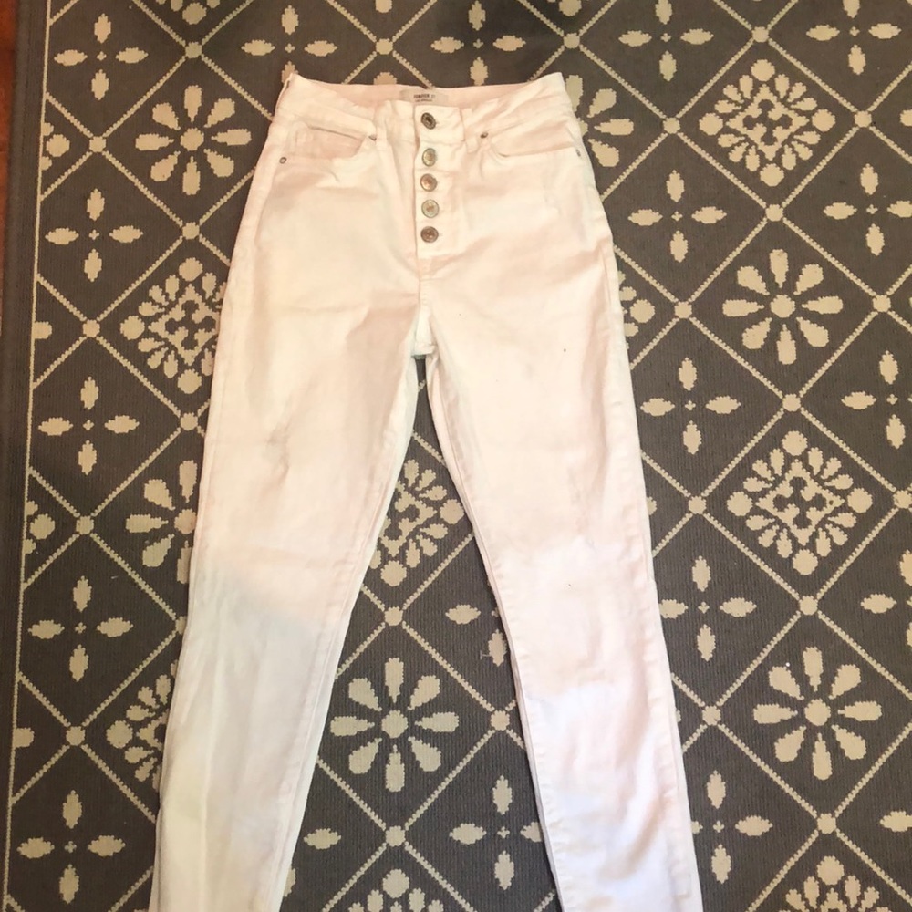 Forever 21 white size 24 button up skinny jeans.
